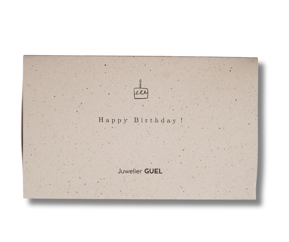 Goldbarren in einer Geschenkbox